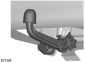 A 13-pin trailer socket and the tow ball armseat are provided underneath the rearbumper. Turn the trailer socket downthrough 90 degrees until it engages in theend position.