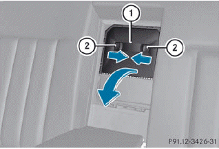 •► Fold down the rear seat armrest.