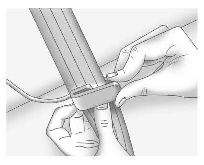 2. Place the guide over the belt, and insert the two edges of the belt into the slots of the guide.