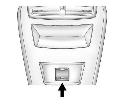 The power outlet is located on the rear of the center console.