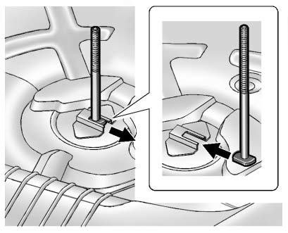 2. Slide the shorter bolt to remove it from the floor and insert the longer one.