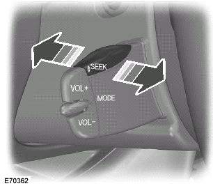 Move the SEEK switch towards thesteering wheel or the instrument panel: