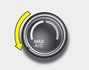 To operate the MAX A/C, turn the temperature knob to extreme left. Air flow is