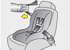 3. Pull the shoulder portion of the seat belt all the way out. When the shoulder