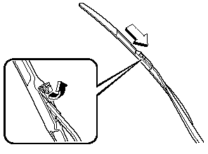 2. Open the clip and slide the blade assembly in the direction of the arrow.
