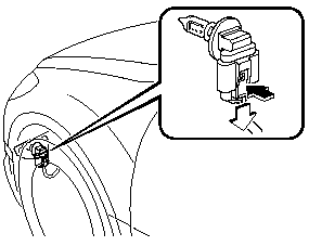 2. Disconnect the electrical connector from the bulb by pressing the tab on the