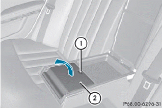 •► Fold down the rear seat armrest.