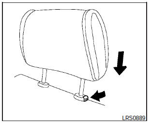 To lower, push and hold the lock knob and push the headrest down.