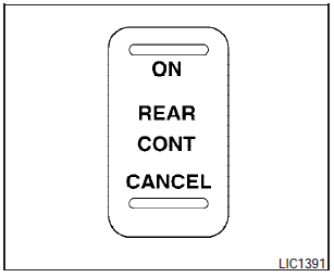 The rear control cancel switch operates when the ignition switch is placed in