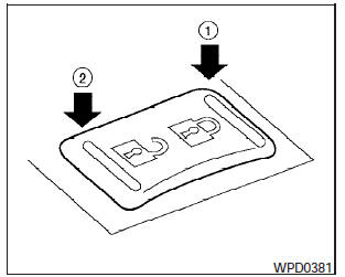 To lock all the doors without a key, push the door lock switch (drivers or front