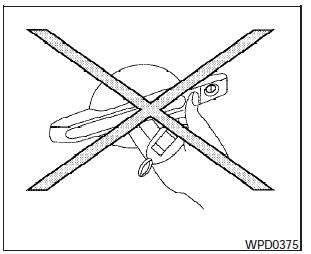 -Do not push the door handle request switch with the Intelligent Key held in