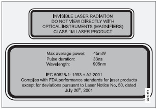 The upper decal describes the laser beam's classification and contains the following