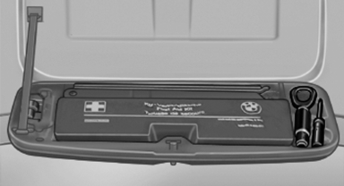 The onboard vehicle tool kit is located in a folddown